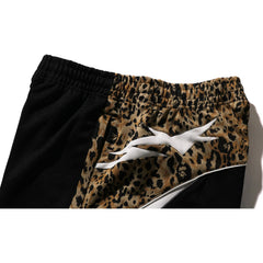 WILD LEOPARD PATTERN OVERSIZED FIT TRACK PANTS MENS